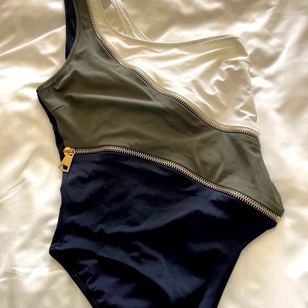Sexy Moeva one piece , size medium